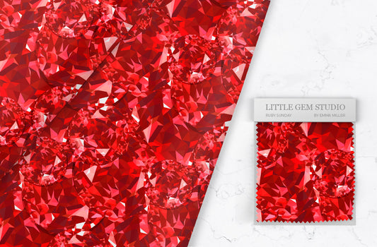 ruby gemstone fabric by emma on a white marble background with her logo on the lower right